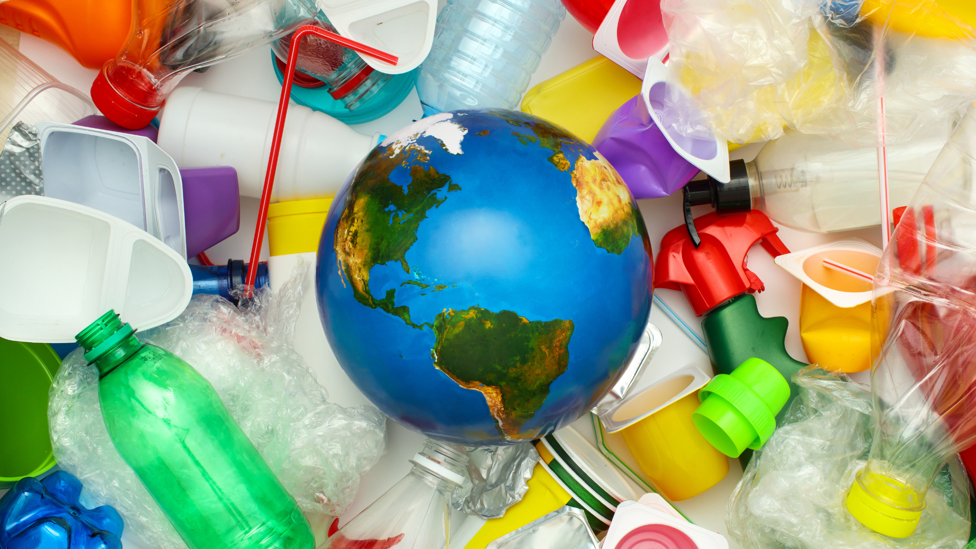 Globe surrounded by various discarded plastic packaging items, including bottles, containers, and wrappers, symbolizing global plastic pollution.